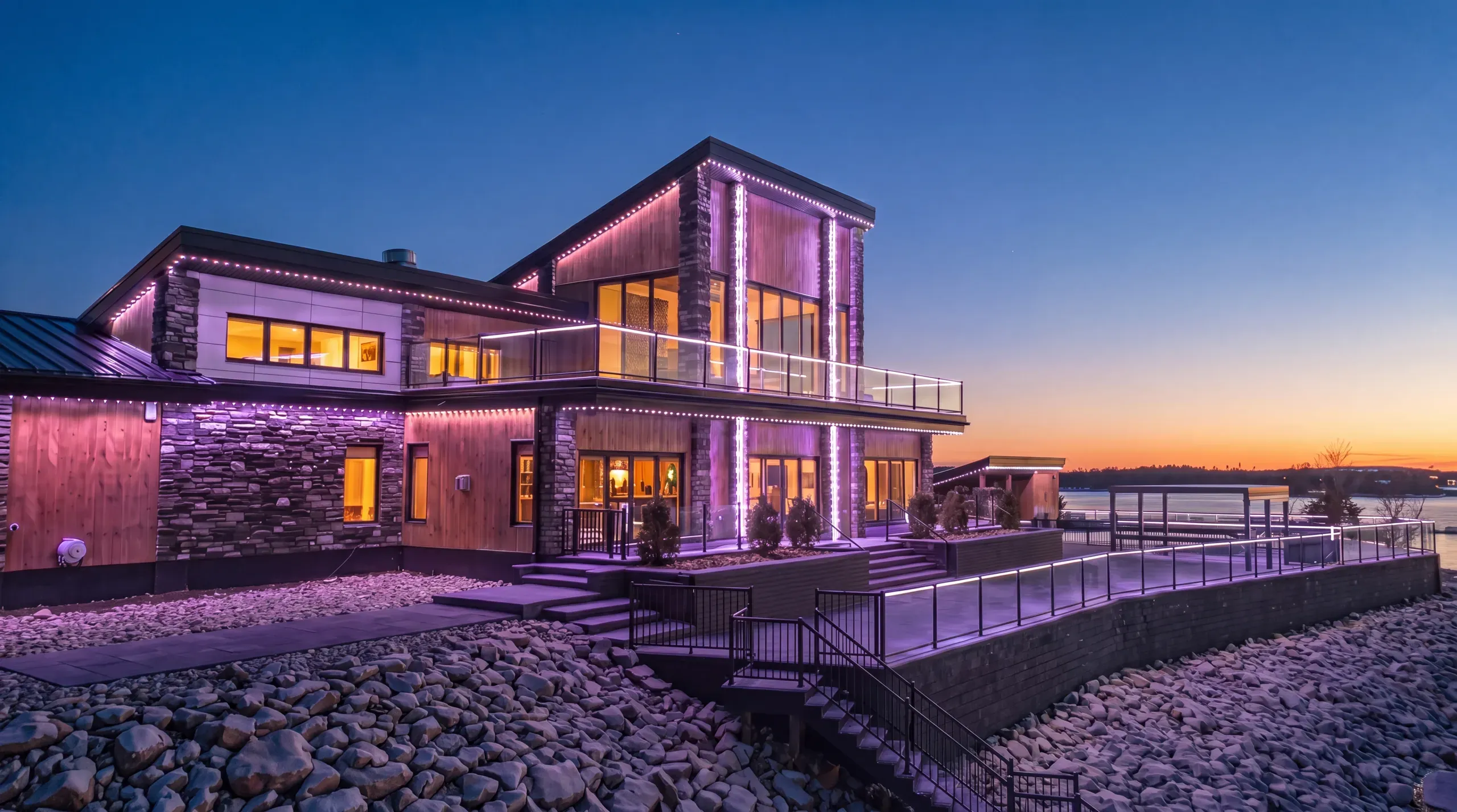 A Québec home lit by a Vision Bleu permanent LED system at blue hour