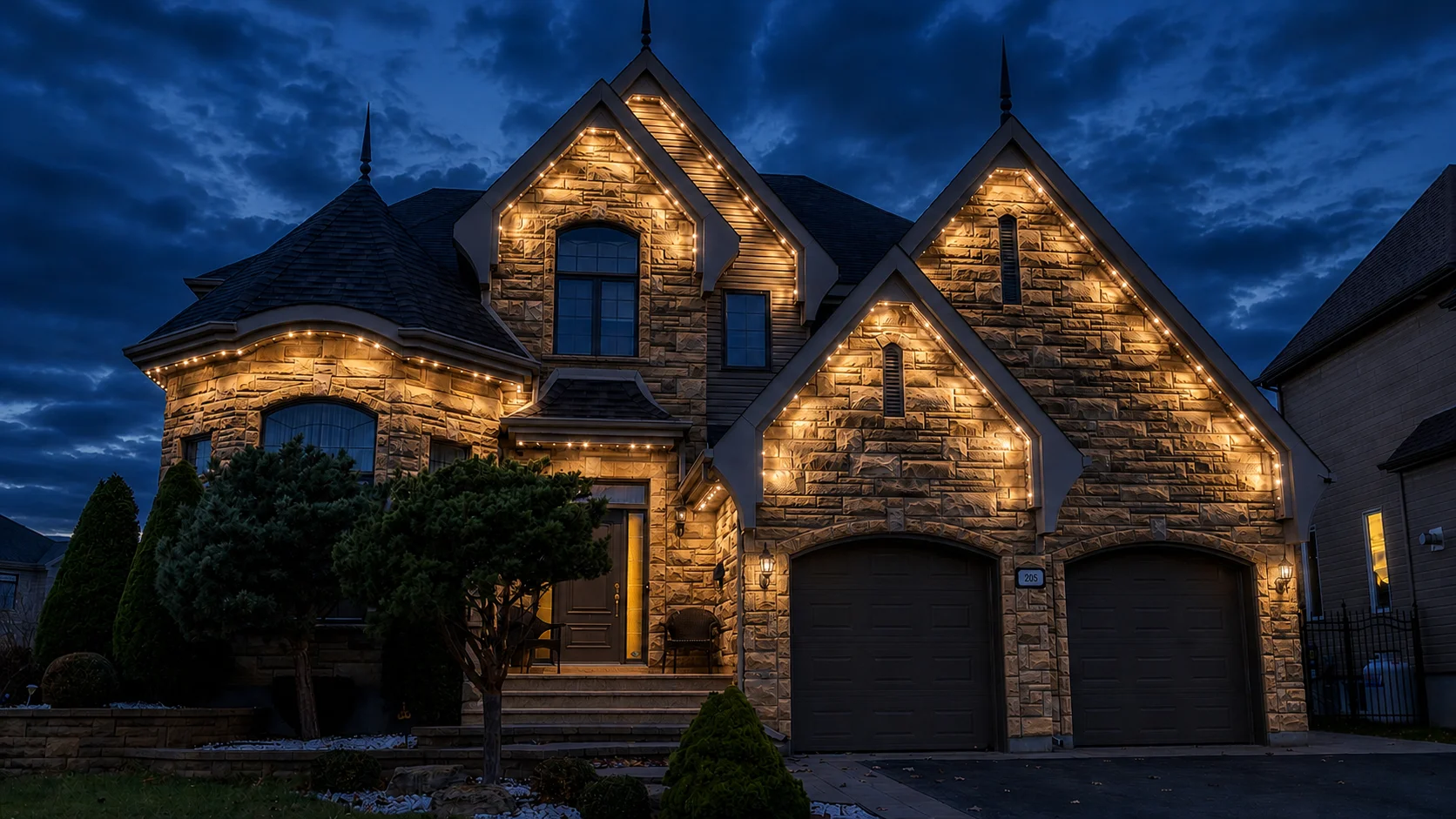 Stone home facade traced in permanent RGB pixel lighting